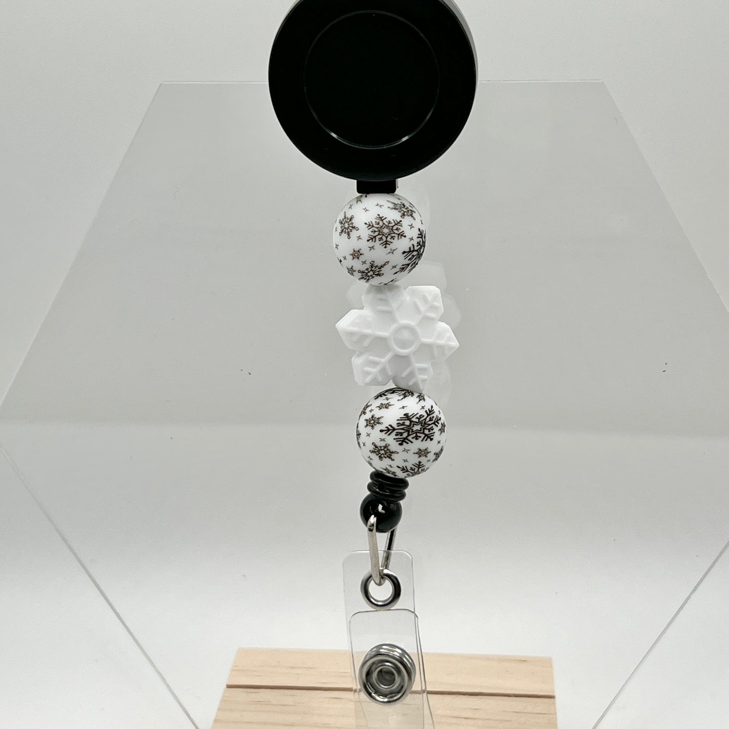 White Snowflake Badge Reel